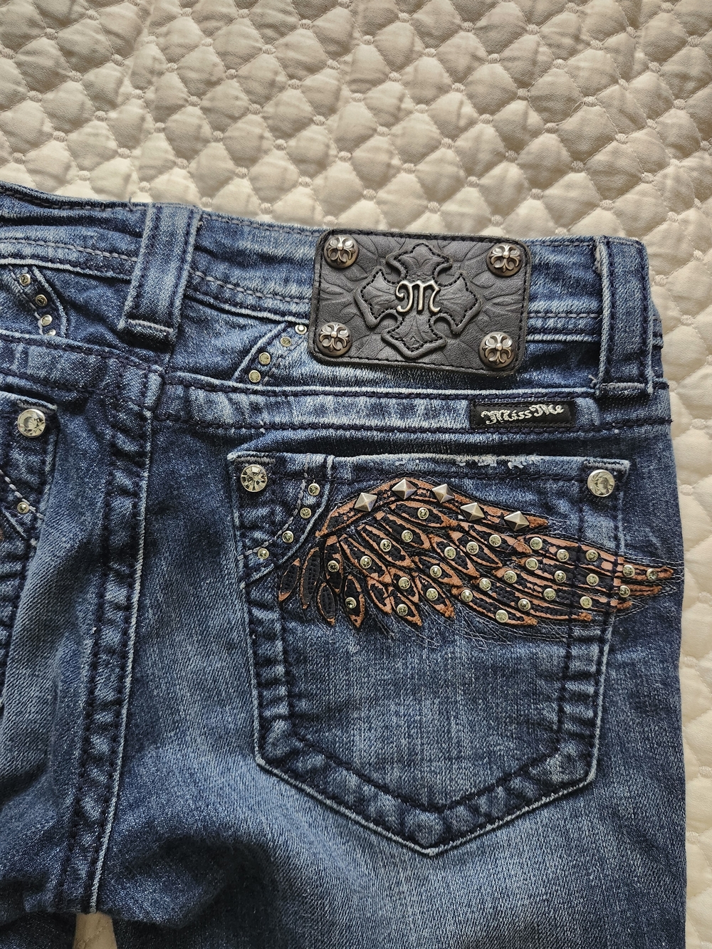 Miss Me Blue Denim Boot Cut Jeans with Wings Made Of Leather.